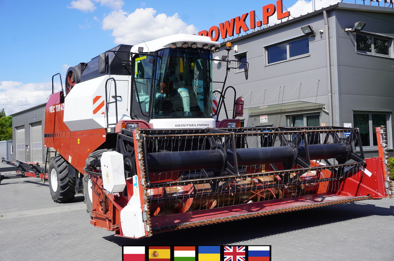 ROSTSELMASH VECTOR 425 RSM-101 grain harvester + Header 5 m + rapeseed harvesting extension / 2300 MTH - Mähdrescher: das Bild 1 ROSTSELMASH VECTOR 425 RSM-101 grain harvester + Header 5 m + rapeseed harvesting extension / 2300 MTH - Mähdrescher: das Bild 1