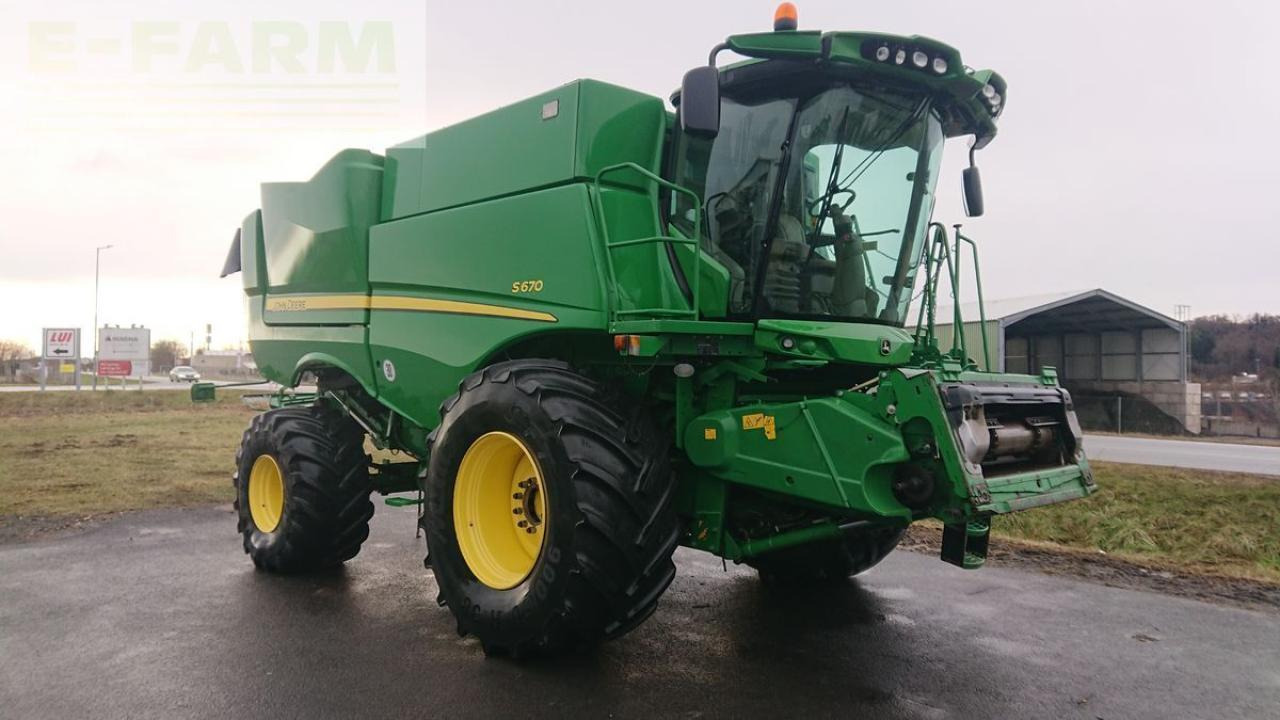 John Deere s670 4wd + macdon fd75 - Mähdrescher: das Bild 2 John Deere s670 4wd + macdon fd75 - Mähdrescher: das Bild 2