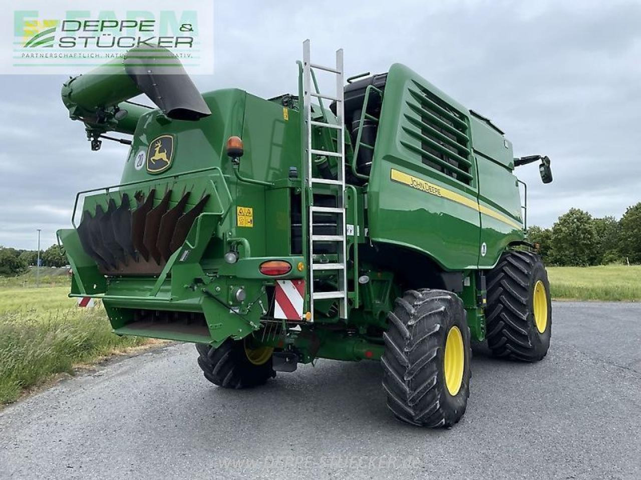John Deere t560 mit 722pf - Mähdrescher: das Bild 2 John Deere t560 mit 722pf - Mähdrescher: das Bild 2