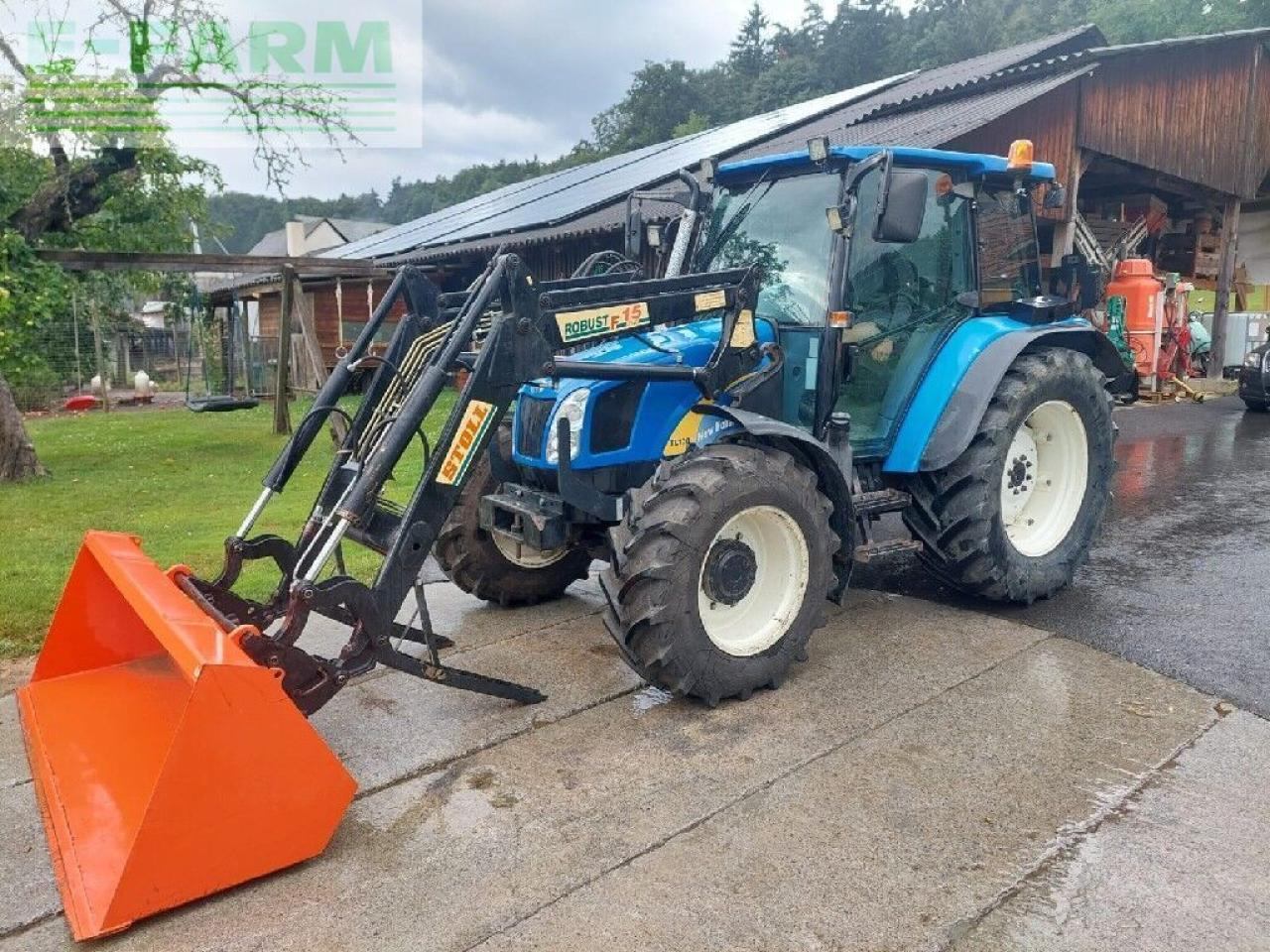 New Holland tl 90 a A - Traktor: das Bild 1 New Holland tl 90 a A - Traktor: das Bild 1
