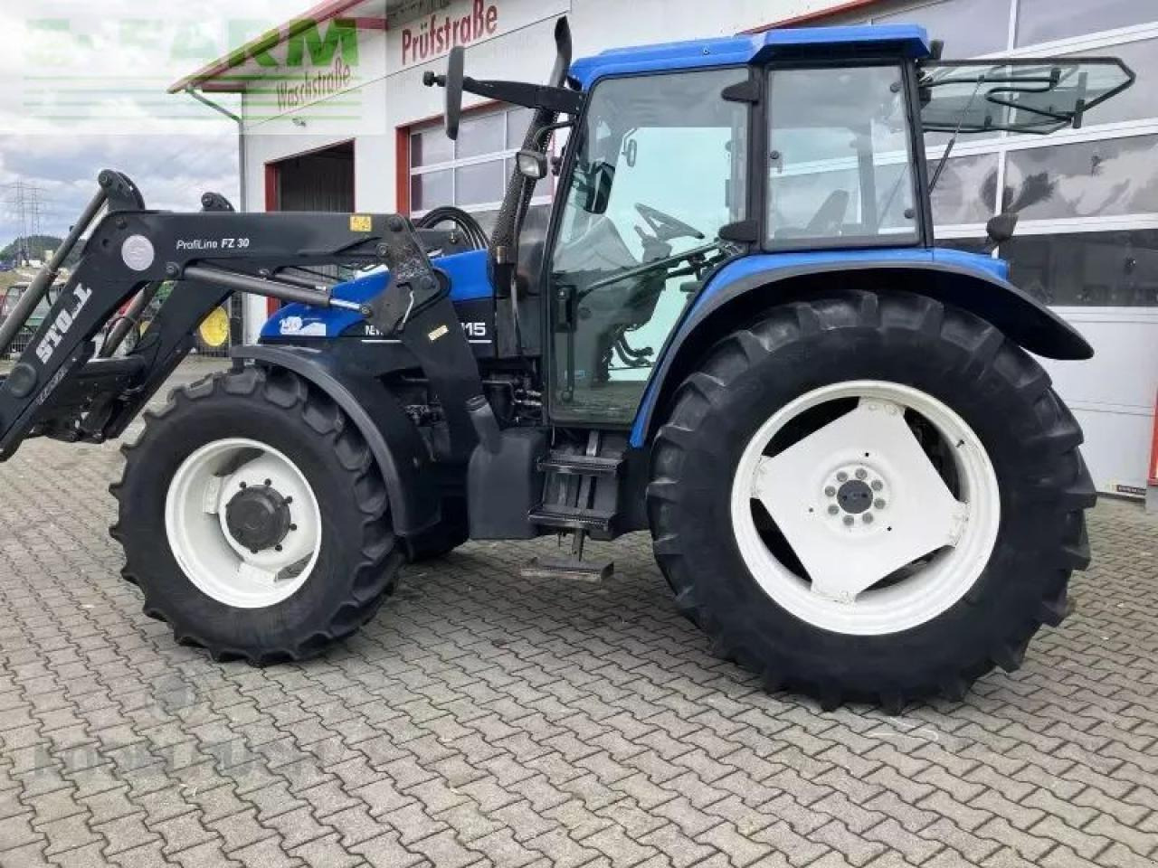 New Holland ts 115 - Traktor: das Bild 1 New Holland ts 115 - Traktor: das Bild 1