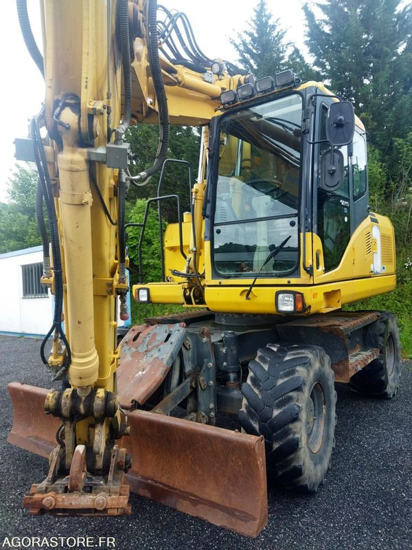 KOMATSU PW140-7 7500H - Bagger: das Bild 3 KOMATSU PW140-7 7500H - Bagger: das Bild 3