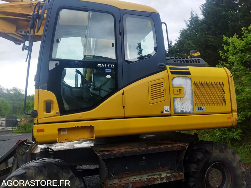KOMATSU PW140-7 7500H - Bagger: das Bild 4 KOMATSU PW140-7 7500H - Bagger: das Bild 4