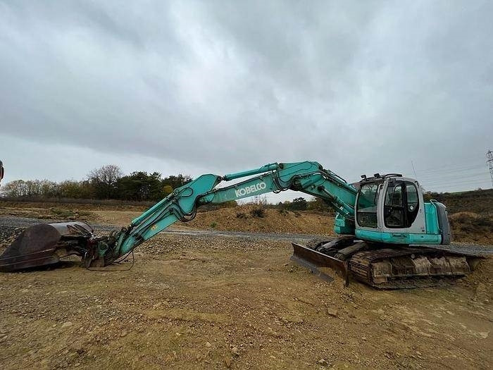 Bagger Kobelco SK235 SR: das Bild 1