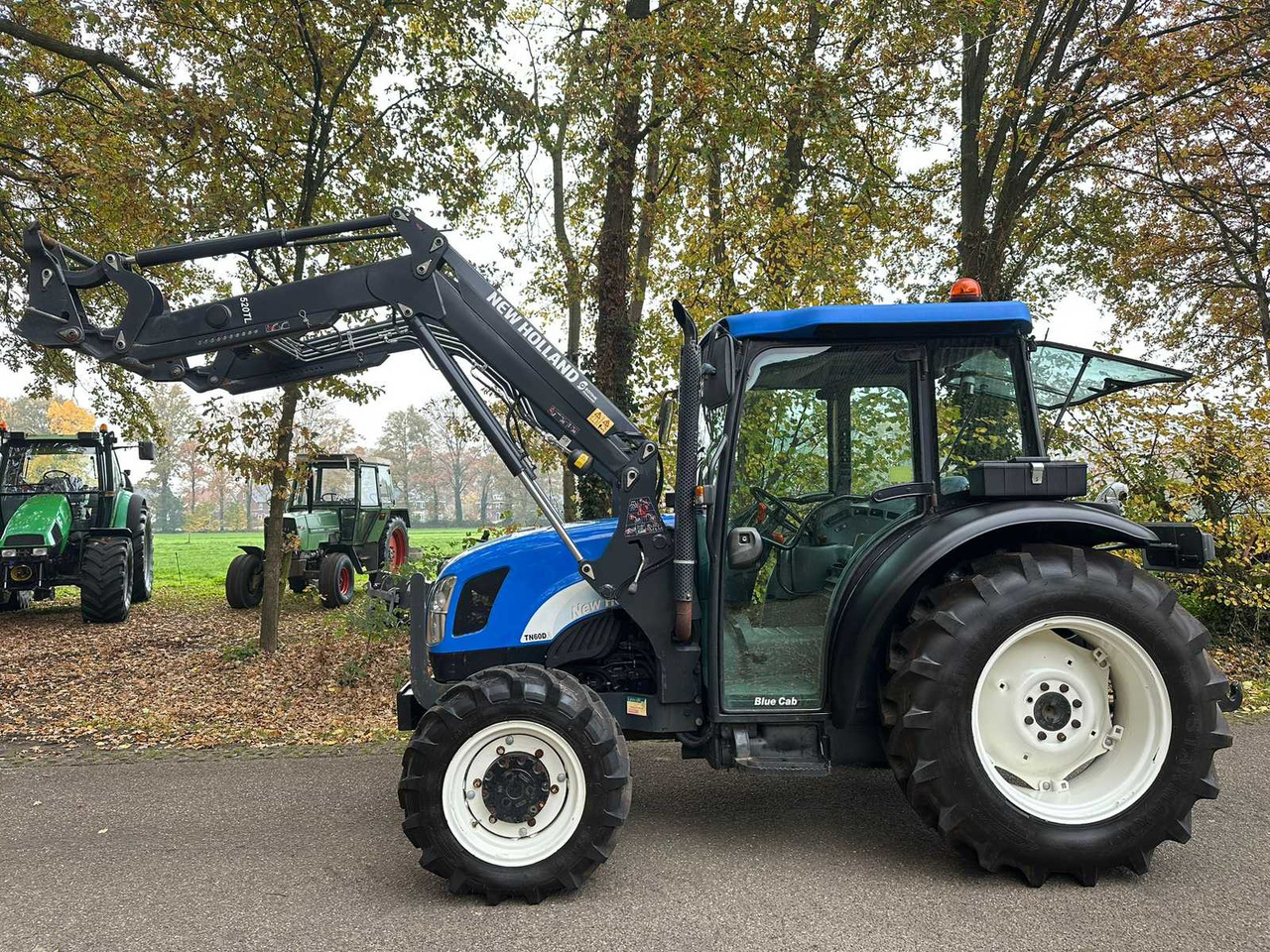 2005 NEW HOLLAND TN60DA ALL-WHEEL DRIVE FARM TRACTOR - Traktor: das Bild 2 2005 NEW HOLLAND TN60DA ALL-WHEEL DRIVE FARM TRACTOR - Traktor: das Bild 2