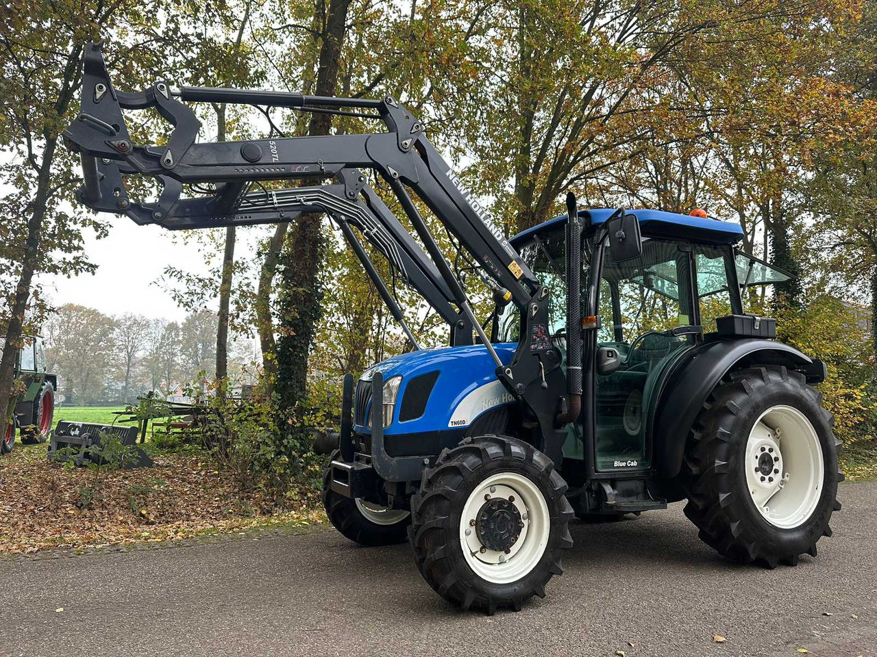 2005 NEW HOLLAND TN60DA ALL-WHEEL DRIVE FARM TRACTOR - Traktor: das Bild 1 2005 NEW HOLLAND TN60DA ALL-WHEEL DRIVE FARM TRACTOR - Traktor: das Bild 1