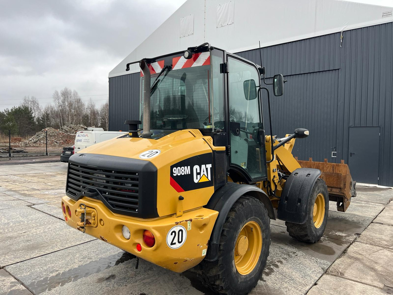 Caterpillar 908M - Radlader: das Bild 4 Caterpillar 908M - Radlader: das Bild 4