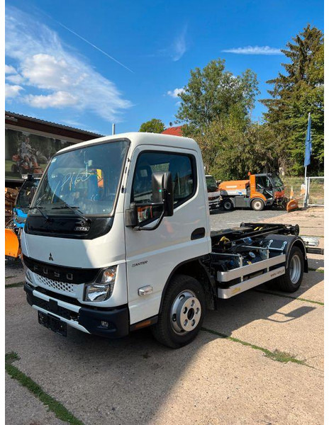 Mitsubishi Fuso Canter 6S15 - Abrollkipper: das Bild 1 Mitsubishi Fuso Canter 6S15 - Abrollkipper: das Bild 1