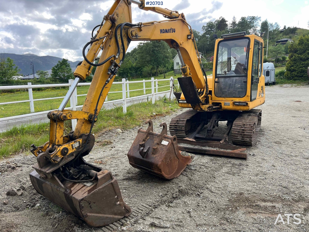 Bagger Komatsu PC75: das Bild 12
