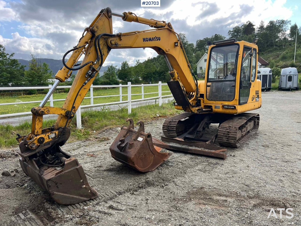 Bagger Komatsu PC75: das Bild 11