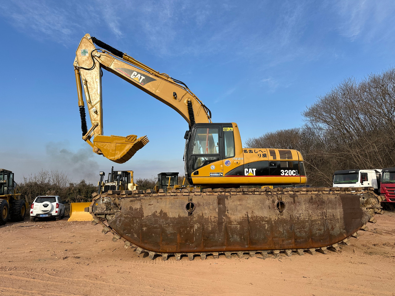 CATERPILLAR 320CL - Amphibische Bagger: das Bild 3 CATERPILLAR 320CL - Amphibische Bagger: das Bild 3
