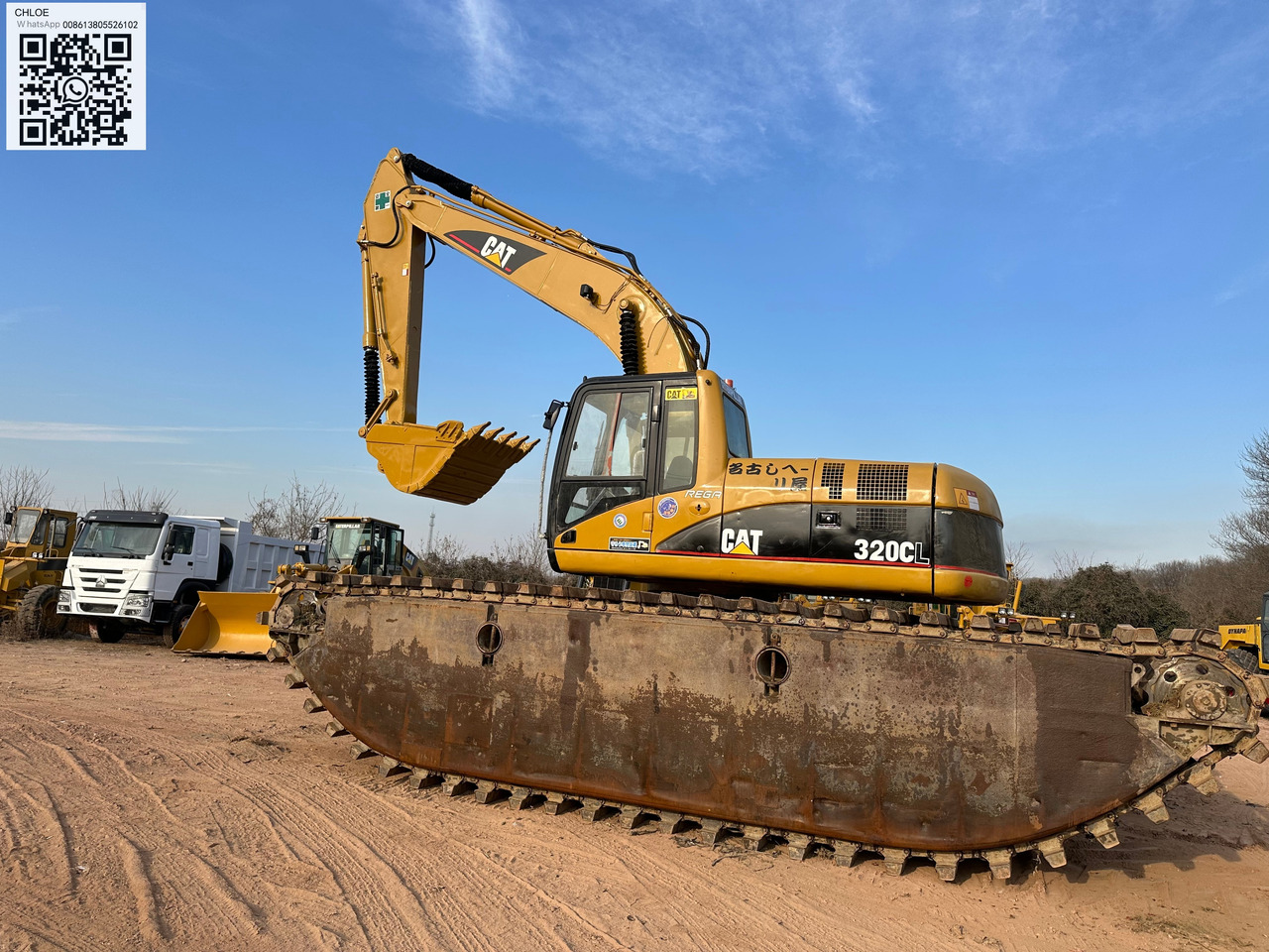 CATERPILLAR 320CL - Amphibische Bagger: das Bild 1 CATERPILLAR 320CL - Amphibische Bagger: das Bild 1