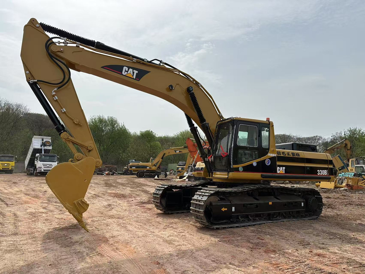 CATERPILLAR 330BL - Bagger: das Bild 1 CATERPILLAR 330BL - Bagger: das Bild 1