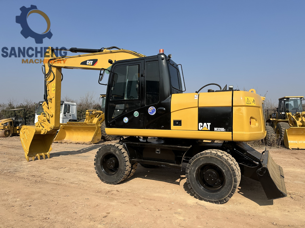 CATERPILLAR M320D2 - Mobilbagger: das Bild 1 CATERPILLAR M320D2 - Mobilbagger: das Bild 1