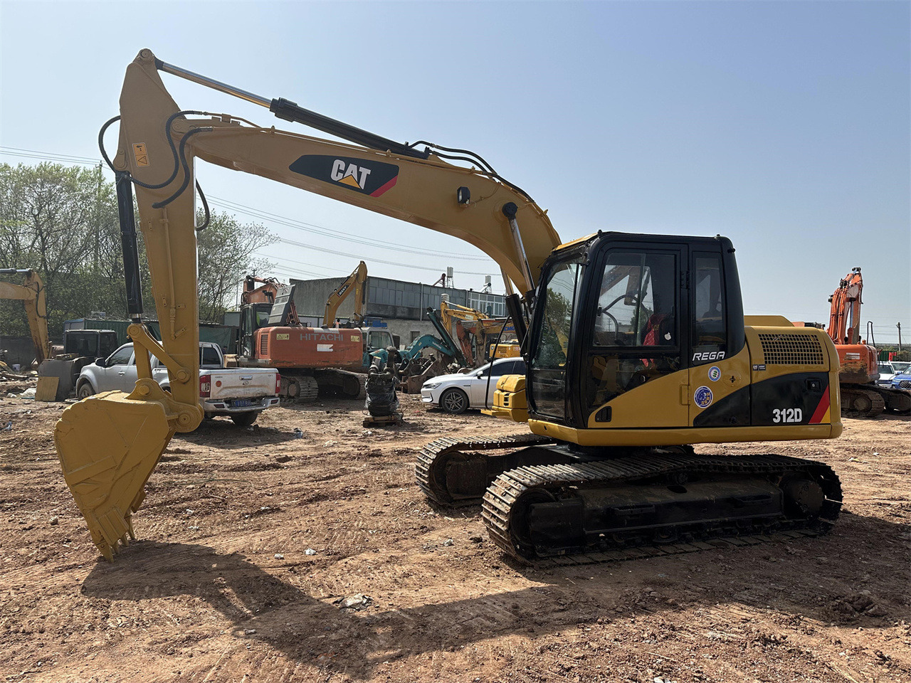 Caterpillar 312D - Minibagger: das Bild 1 Caterpillar 312D - Minibagger: das Bild 1