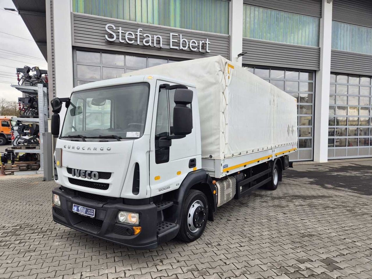 Iveco Eurocargo ML120E25 4x2 AHK Differenzial - Plane LKW: das Bild 1 Iveco Eurocargo ML120E25 4x2 AHK Differenzial - Plane LKW: das Bild 1