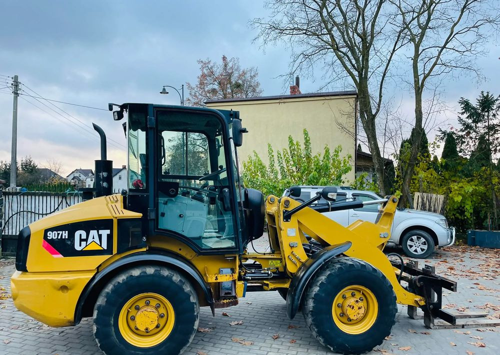 Caterpillar 907H - Radlader: das Bild 1 Caterpillar 907H - Radlader: das Bild 1