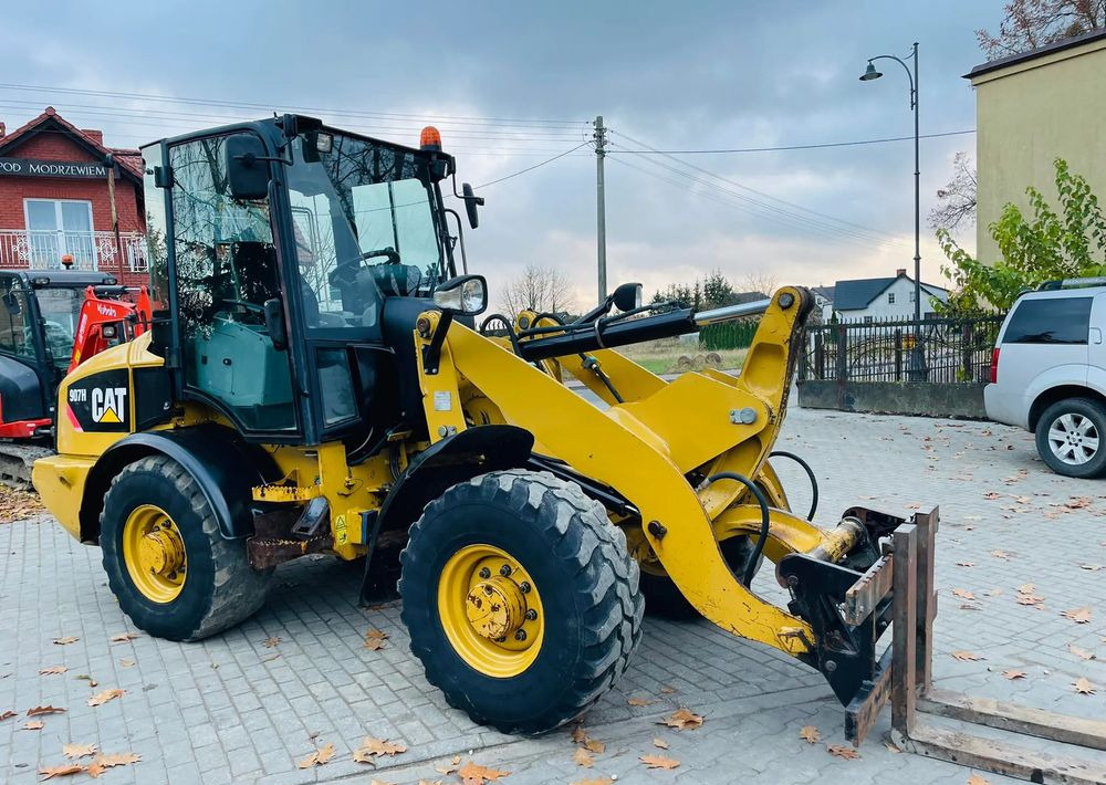 Caterpillar 907H - Radlader: das Bild 2 Caterpillar 907H - Radlader: das Bild 2