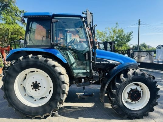 New Holland TL90 - Traktor: das Bild 3 New Holland TL90 - Traktor: das Bild 3