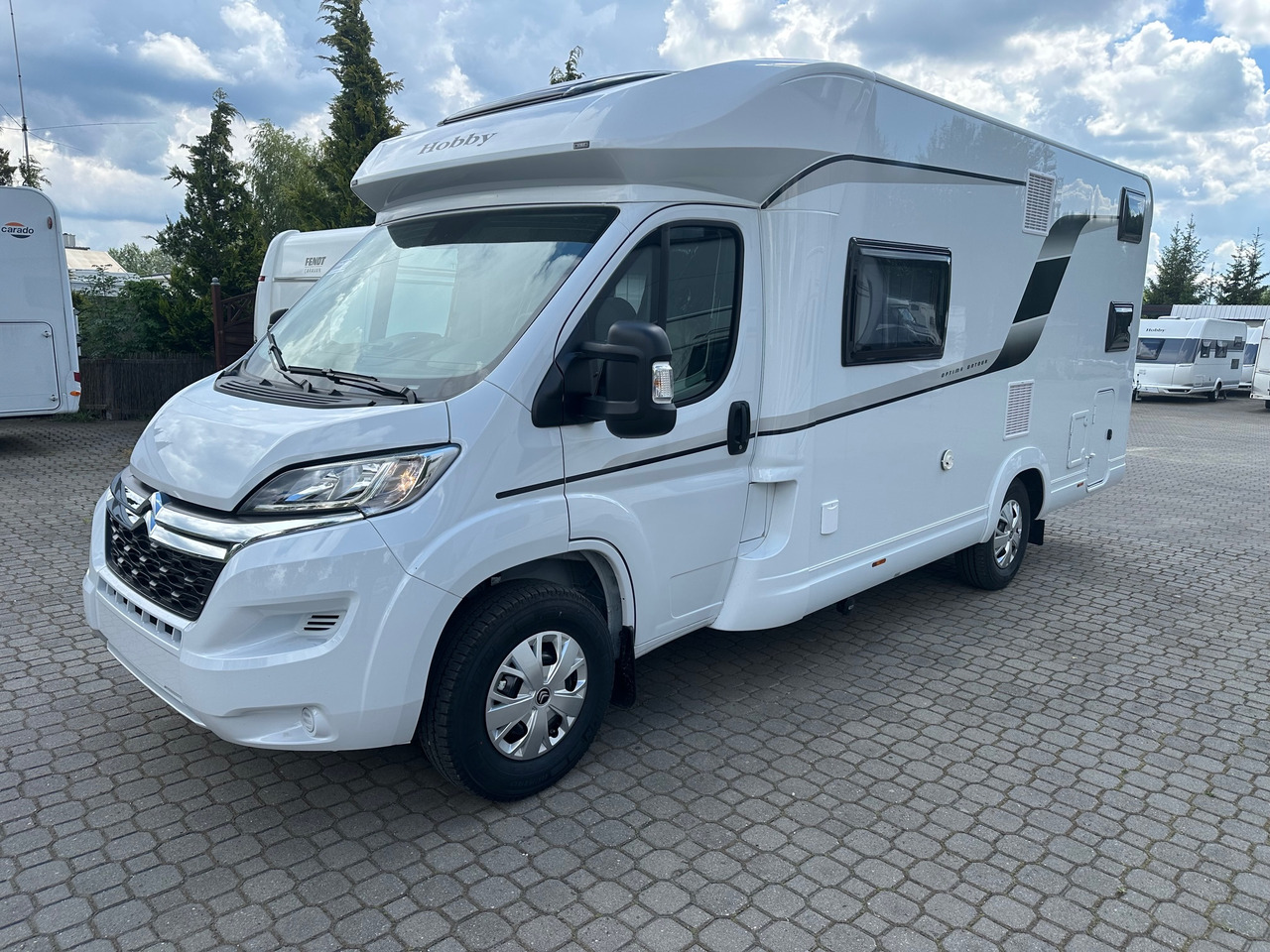 Hobby Optima T65 HKM Ontour 2024 - Teilintegriertes Wohnmobil: das Bild 1 Hobby Optima T65 HKM Ontour 2024 - Teilintegriertes Wohnmobil: das Bild 1