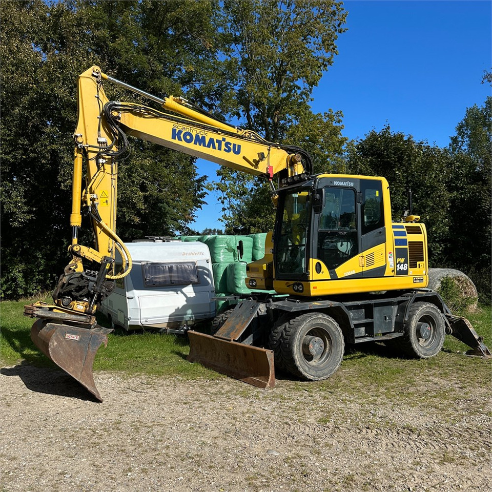 Komatsu PW148-11 - Mobilbagger: das Bild 3 Komatsu PW148-11 - Mobilbagger: das Bild 3