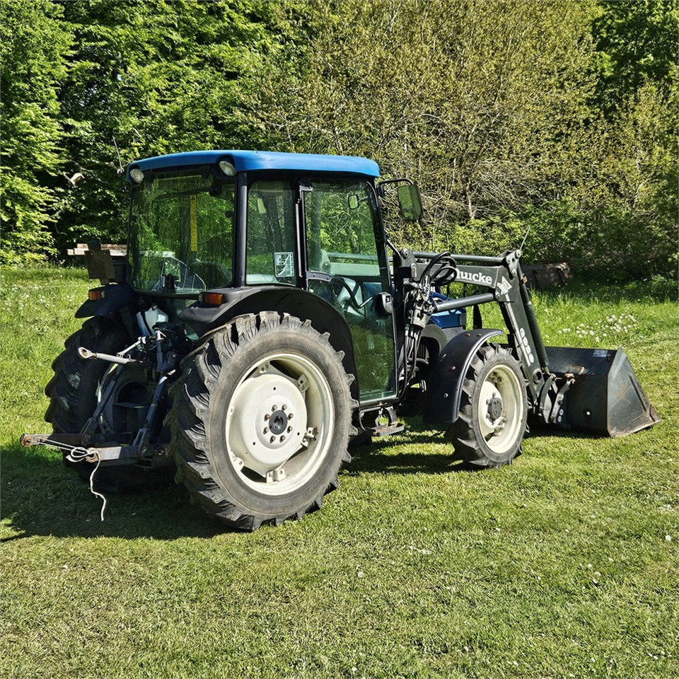 New Holland TN55D - Traktor: das Bild 3 New Holland TN55D - Traktor: das Bild 3