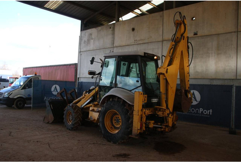New Holland NH95-4PT/E - Baggerlader: das Bild 3 New Holland NH95-4PT/E - Baggerlader: das Bild 3