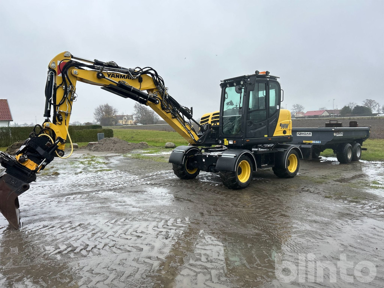 Yanmar B95W - Tippvagn - Tiltrotator - 6 Redskap - Mobilbagger: das Bild 2 Yanmar B95W - Tippvagn - Tiltrotator - 6 Redskap - Mobilbagger: das Bild 2
